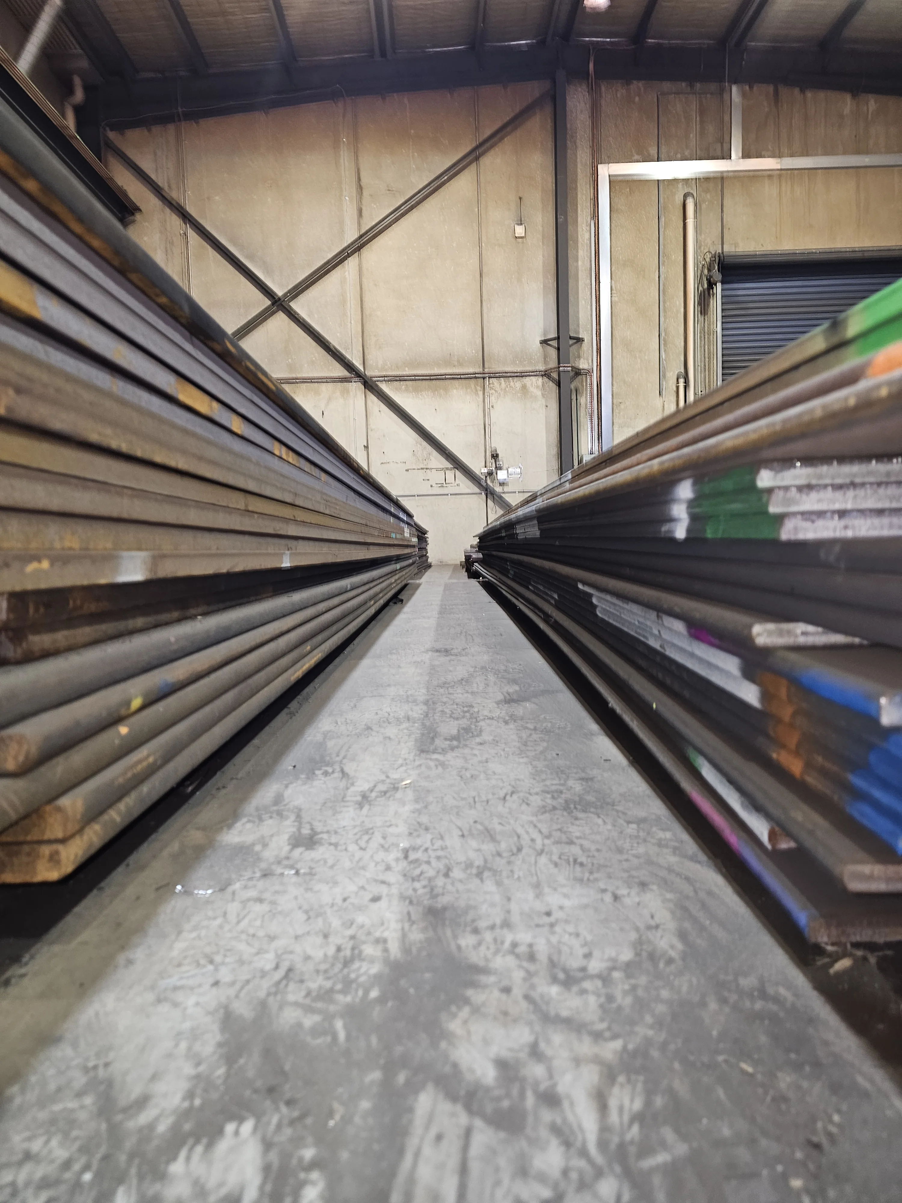 Steel plate inventory aisle at M-Steel Dandenong South